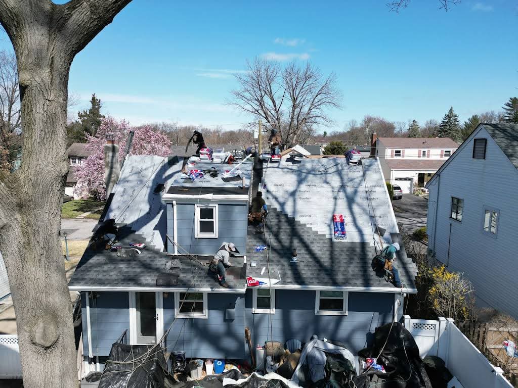 Right Deal Construction crew at work on a roof in Bucks County, PA